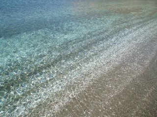 The crystal clear waters of Agia Kiriaki Beach - Milos, Greece