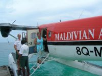 Arriving Maldives Veligandu Island beach by plane