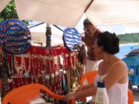Buying from vendors along Praia Tartaruga - Tartaruga Beach Búzios