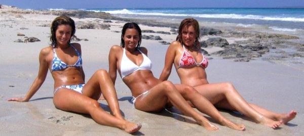 Girls on the beach in Ibiza, Spain