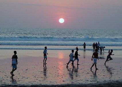 Football at sunset, Legian Beach