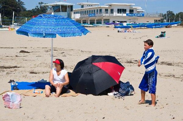 Tanning in the sun at Santa Cruz Beach, California