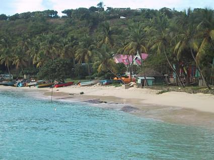 Colorful fishing boats and buildings, Mustique